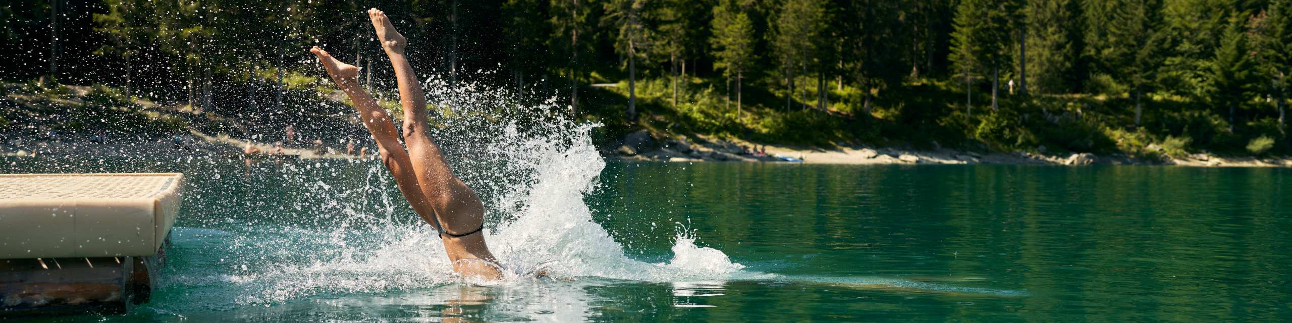 (c)NI Photography, Nicolas Iliano, Schwimmerin taucht in Caumsee